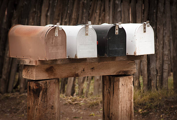 istock Line of Rural US Mailboxes in Earth Tones 505396395