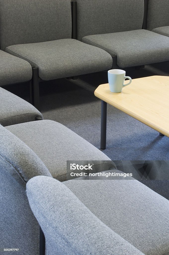 Modern school staff room Seating area in a modern school staff room. Chair Stock Photo