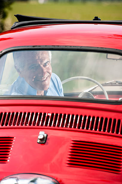 istock Senior Man In Vintage Car 505397883