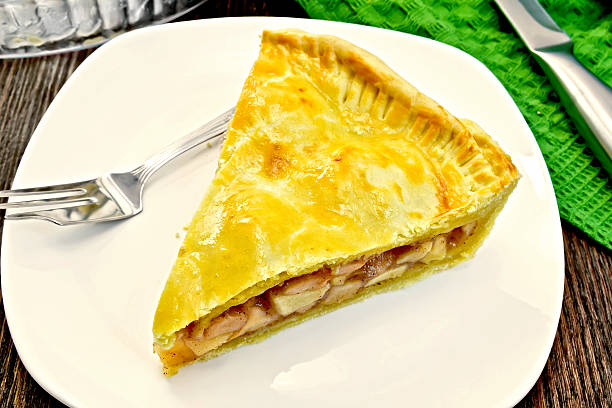 istock Pie apple american in plate on dark board 505397950
