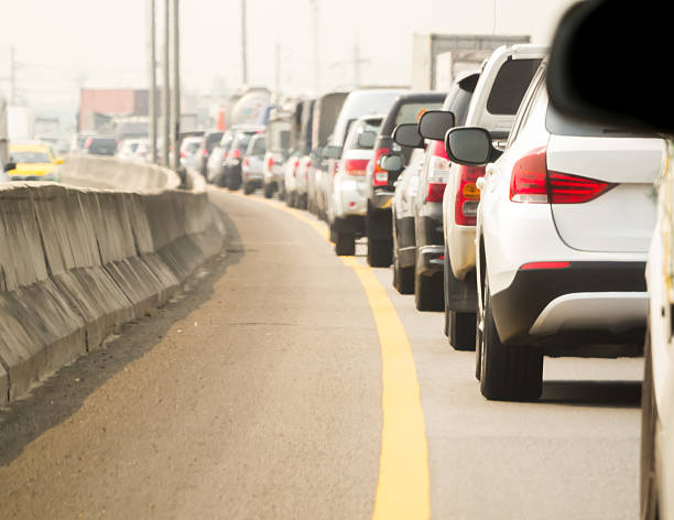 istock Car queue in the bad traffic road 505399277