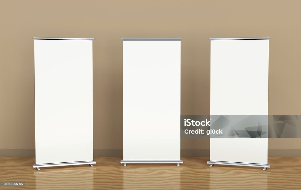 Roll-up banners Blank roll-up banners against the brown wall Chin-Ups Stock Photo