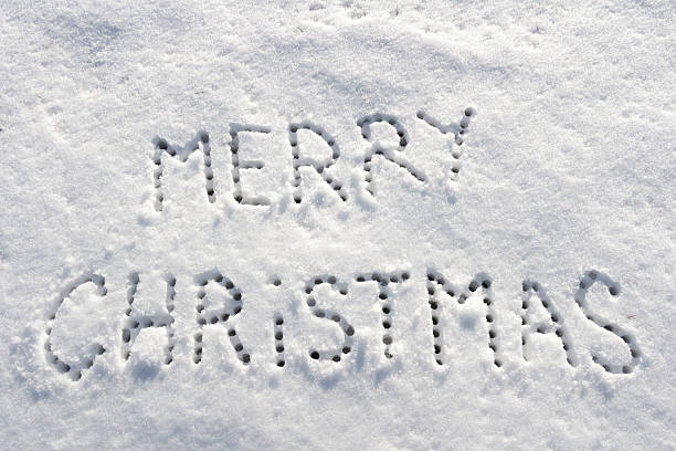 istock Written words Merry christmas on a snow field. 505401082