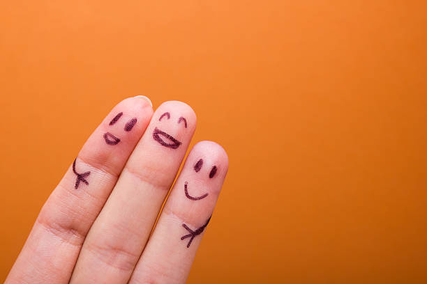 istock three smiling fingers that are very happy to be friends 505402090
