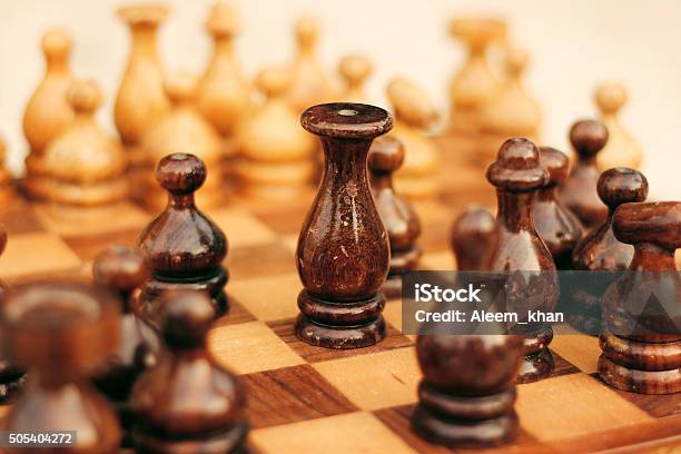 Wooden Chess Board With The King In Focus Stock Photo - Download Image Now - Achievement, Activity, Authority