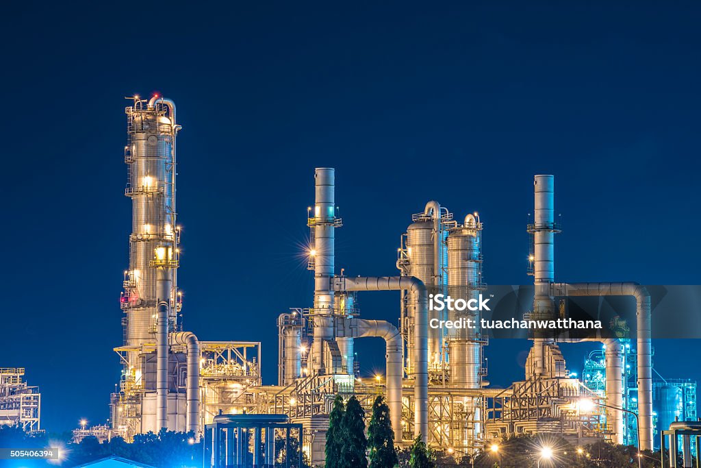 Oil Refinery with twilight sky Oil Refinery Cooking Oil Stock Photo