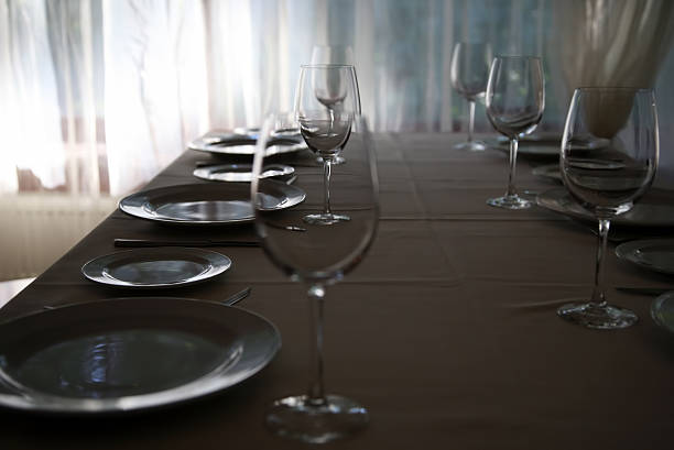 istock table setting in restaurant Cutlery near the window, backlit 505407498