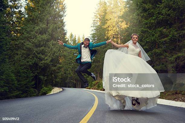 Feeling The Joy Together Stock Photo - Download Image Now - Bride, Groom - Human Role, Bizarre