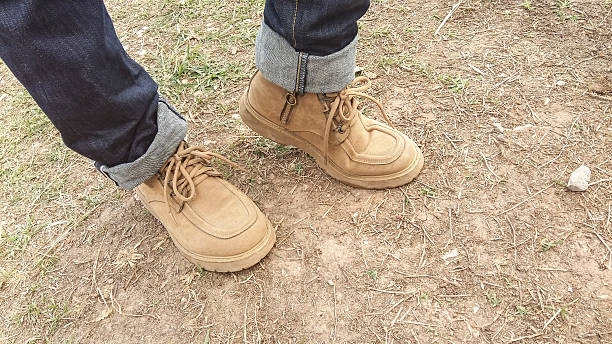 istock Lags with shoes walking on the grounds 505410552