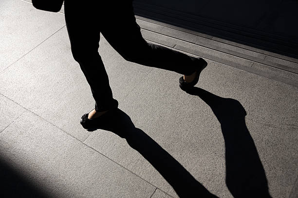 istock Shadows of walking 505413730