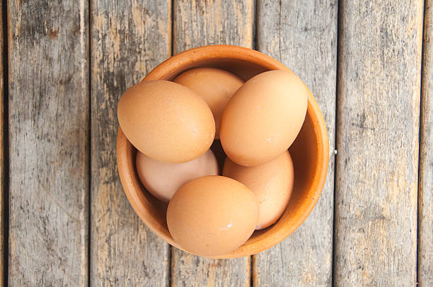 istock top view of eggs in bowl 505413752