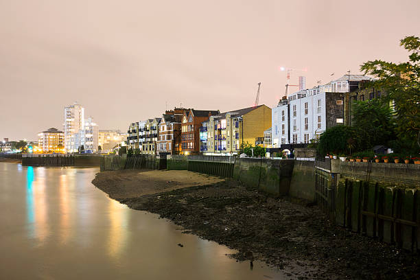 istock Buildings at night along the River Thames 505413938