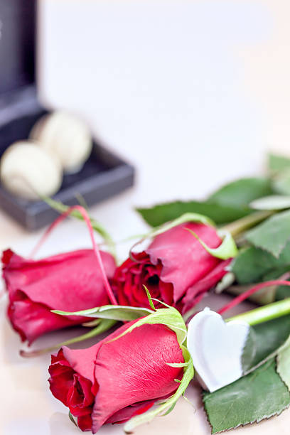 istock Chocolate truffles and red roses with copy space 505415540