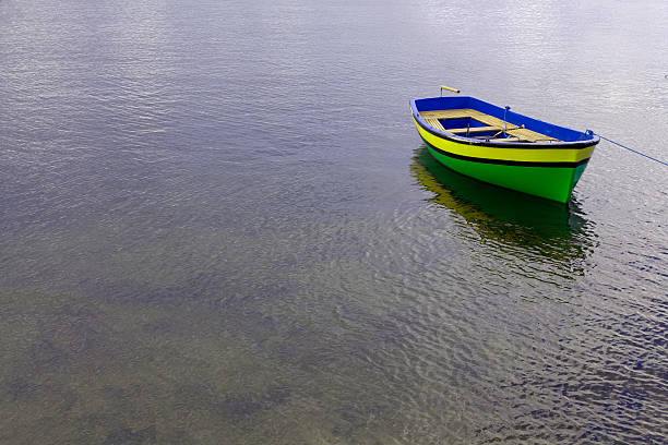 boat on the lake boat moored on the shore