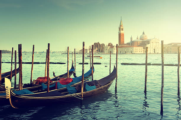 istock Gondolas and San Giorgio Maggiore church in Venic 505442821
