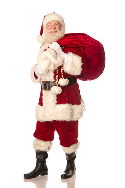istock Santa Claus carrying his gift bag 505444601