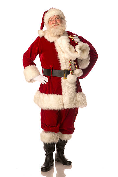 Santa Claus carrying his gift bag stock photo