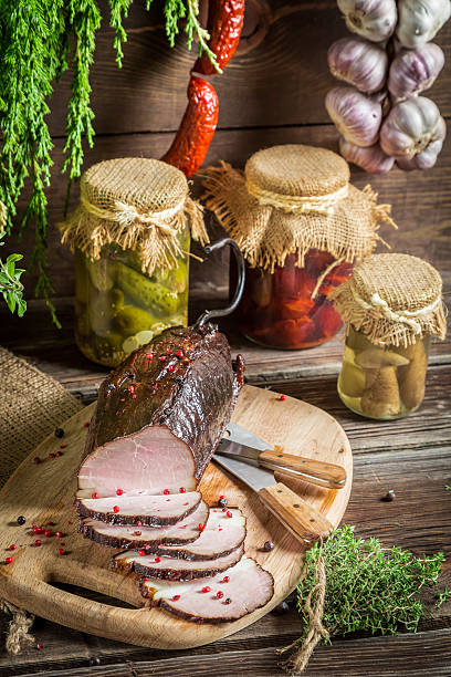 istock Freshly sliced smoked ham and marjoram 505444951