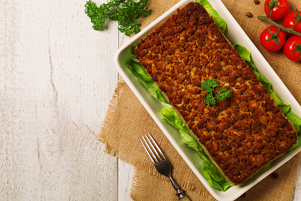 istock Homemade meat pie with vegetables, served with cranberry sauce 505463778