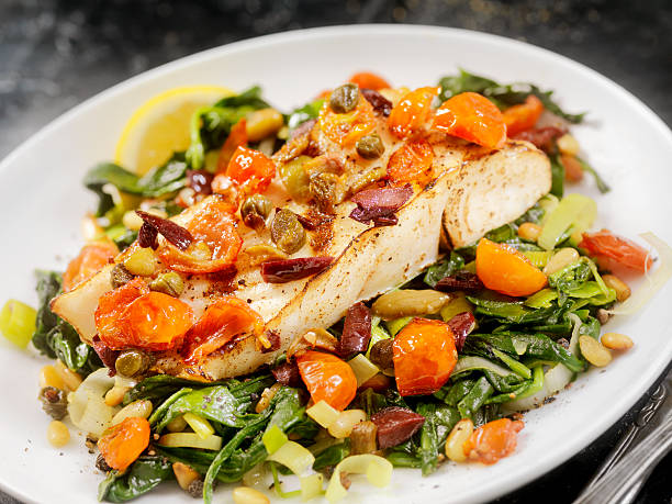 istock Grilled Halibut with Capers,Olives and Tomatoes 505463792