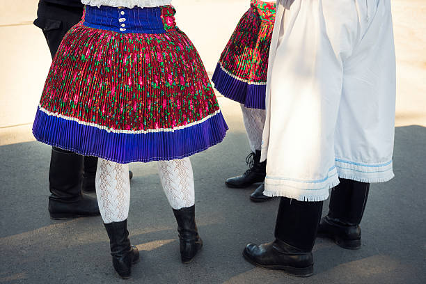 istock Anonymous group of people in folklore costumes 505465176
