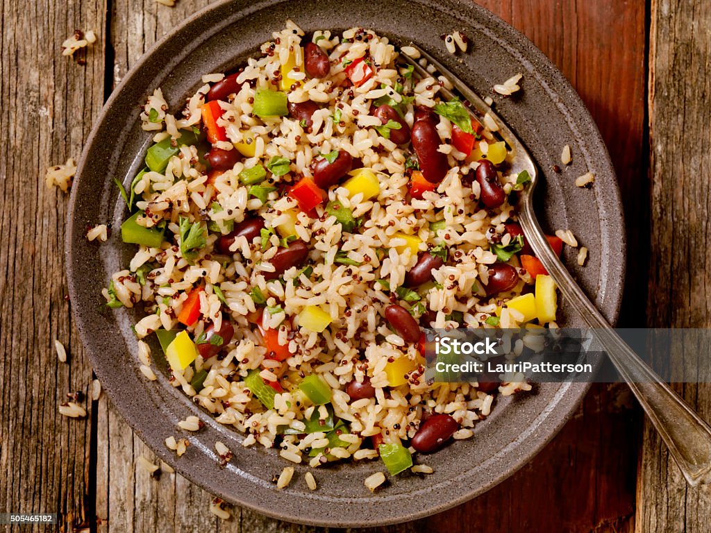 Quinoa and Brown Rice Salad Quinoa and Brown Rice Salad with Peppers and Beans-Photographed on Hasselblad H3D2-39mb Camera Brown Rice Stock Photo