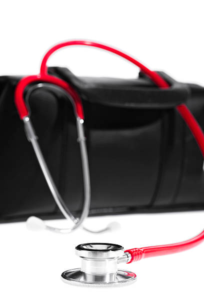 istock Red stethoscope and a Doctor's bag on a white background 505468652