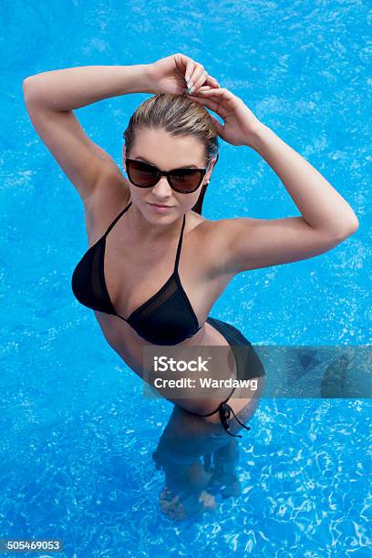 Swimsuit Model With Arms Over Head Stock Photo - Download Image