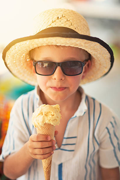 istock Little boy eating ice cream. 505471643