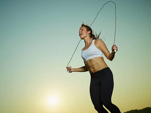 istock Woman and skipping rope 505472377