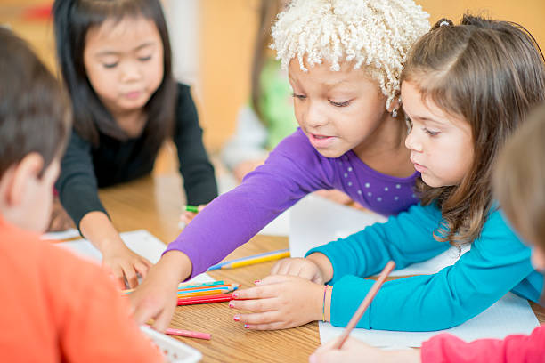 istock Coloring Together in the Classroom 505473182