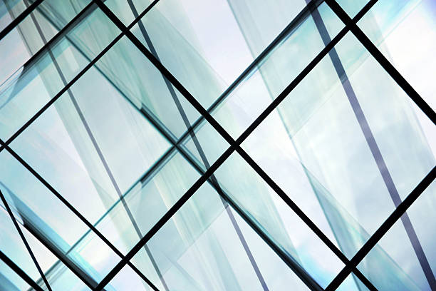 istock Double exposure close-up of structured glass / glazed aluminum structure 505473340
