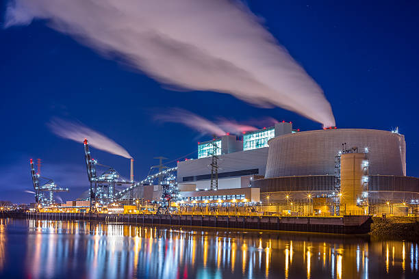 Power plant A big coal fired power plant. long exposure industry factory hamburg germany stock pictures, royalty-free photos & images