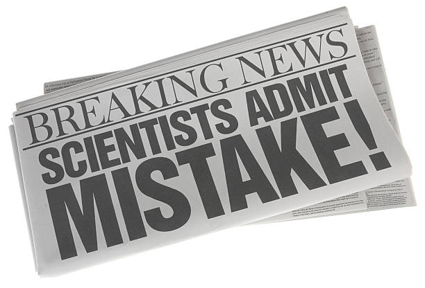 istock Scientists Admit Mistake - Stock Image of Newspaper on White 505482961