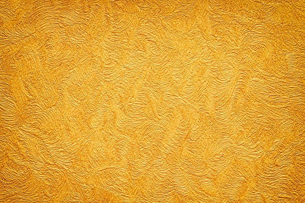 istock Gold background texture. Wallpaper on the wall. 505483225