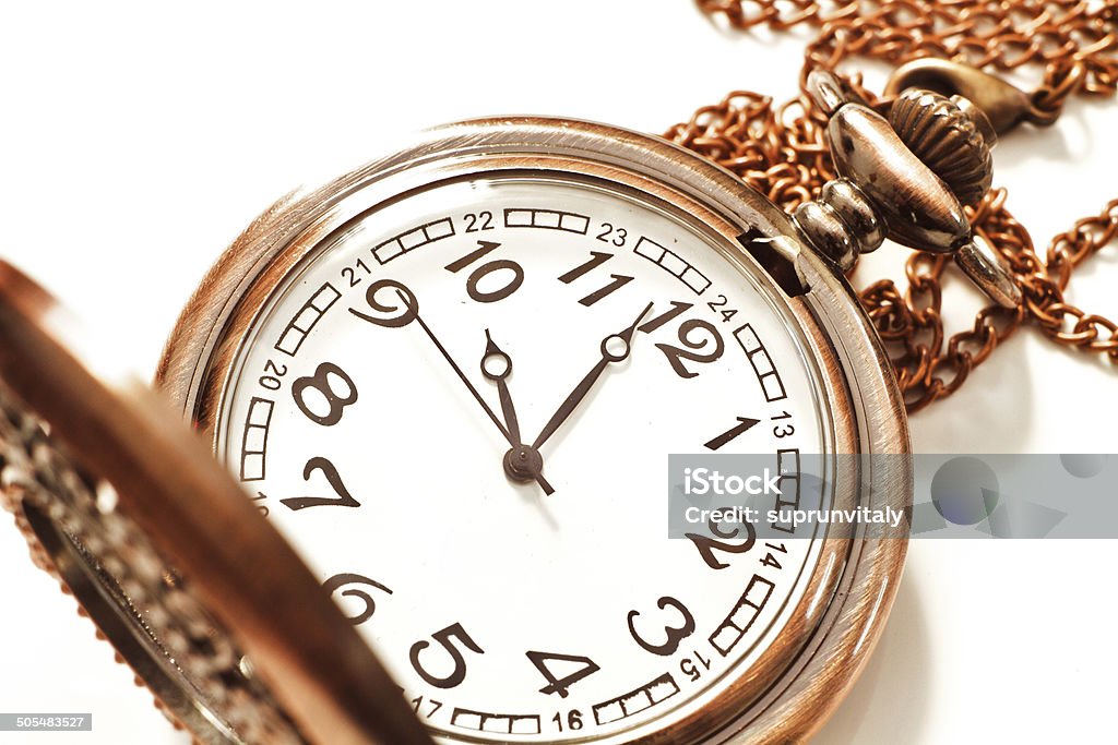 Old isolated watch Beautiful photos of vintage watches on a chain. Isolated on white. Antiquities Stock Photo