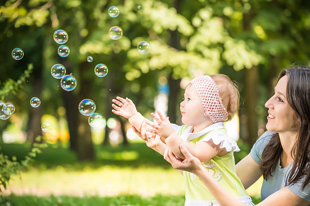 istock Mother play with baby 505485453