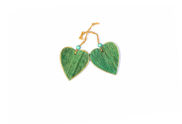 istock Green Wooden Hearts On White 505487818