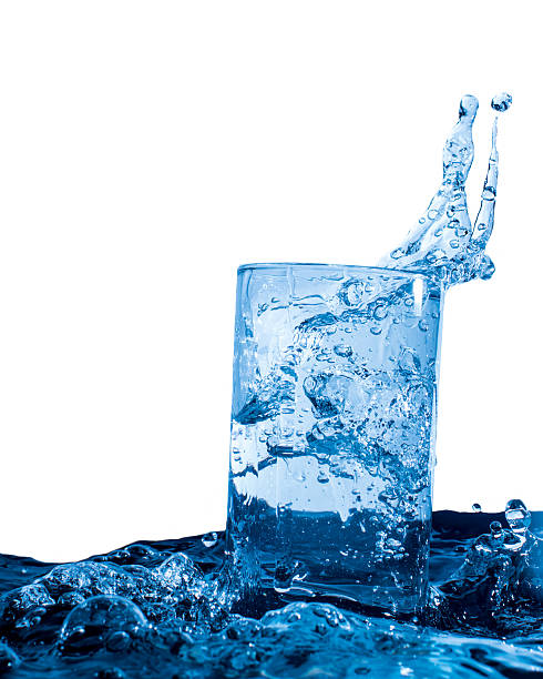 istock Glass with water and splash 505488108