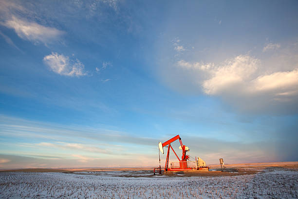 prairie pumpjack im winter - okotoks stock-fotos und bilder