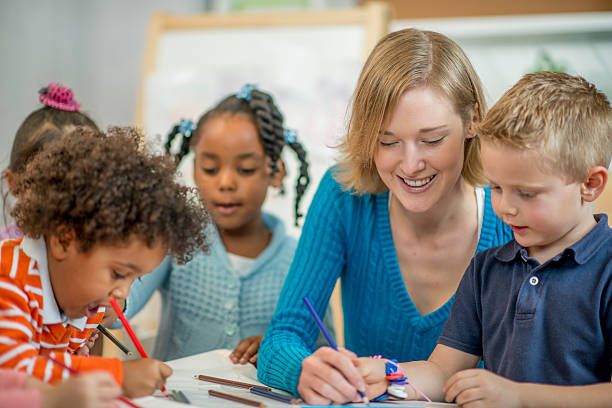 istock Children Happily Coloring 505489470