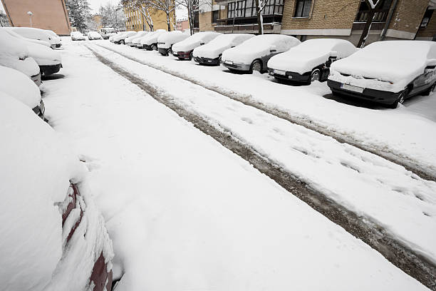 istock Cars covered with snow on parking lot 505490850