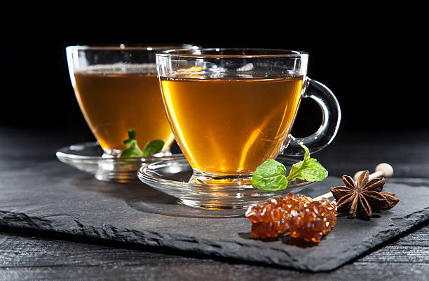 istock Cup of tea on dark background 505491596