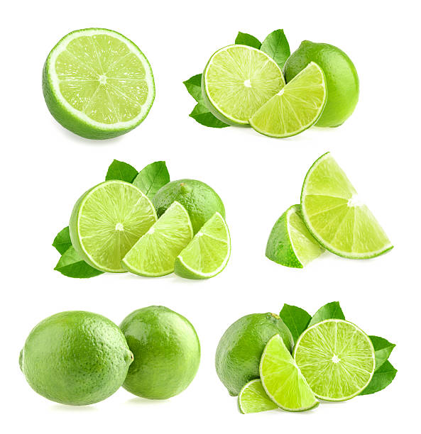 aislado de lima - limones verdes fotografías e imágenes de stock