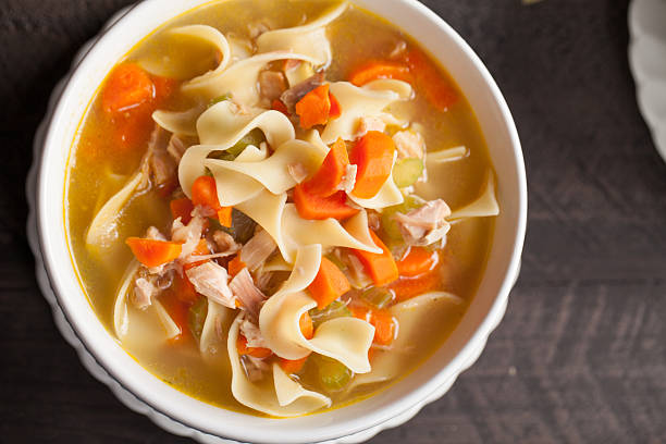 istock Top view of turkey noodle soup 505492440