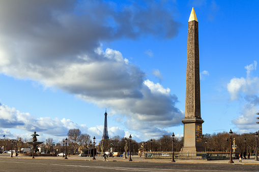 Cloudy day at the place de la Concorde with the Obelisk and Eiffel tower, in Paris, France.