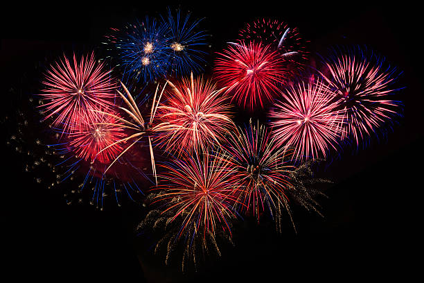 istock Red golden blue fireworks over night sky 505495090