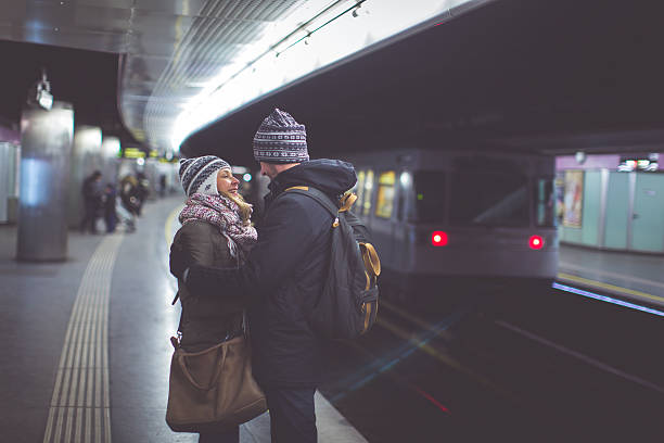 istock Couple at subway station waiting for train 505496438