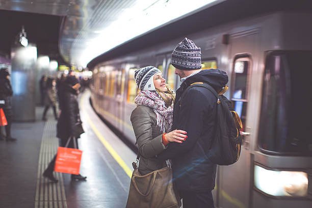 istock Couple at subway station waiting for train 505497744