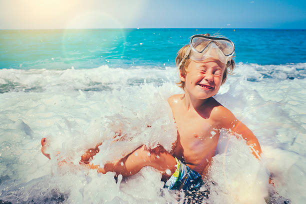 istock Child wearing scuba mask 505498204